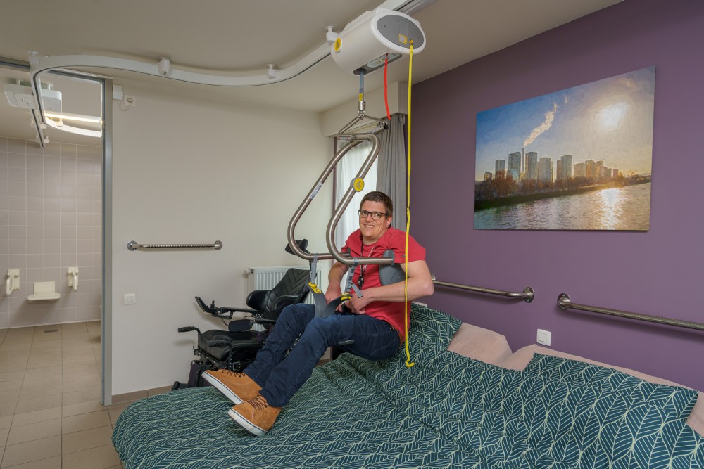 Ceiling motor ; Ceiling track rails ; Handi-Move Body Support® - Handi-Rehab Patient lift hoist