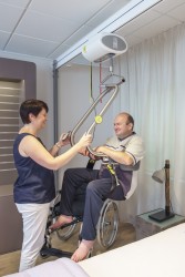 Ceiling hoist - with motor fixed on the rail ; The freedom bridge - Handi-Rehab Patient lift hoist