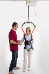 Ceiling hoist - with motor fixed on the rail ; Walking harness - Handi-Rehab Patient lift hoist