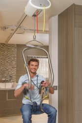 Ceiling hoist - with motor fixed on the rail ; Handi-Move Body Support® - Handi-Rehab Patient lift hoist