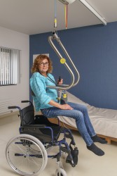 Ceiling hoist - with motor fixed on the rail ; Handi-Move Body Support® - Handi-Rehab Patient lift hoist