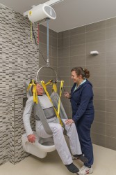 Ceiling hoist - with motor fixed on the rail ; Hygiene sling with head support ; Standard spreader bar - Handi-Rehab Patient lift hoist
