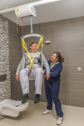 Ceiling hoist - with motor fixed on the rail ; Hygiene sling ; Flat 2-points spreaderbar - Handi-Rehab Patient lift hoist